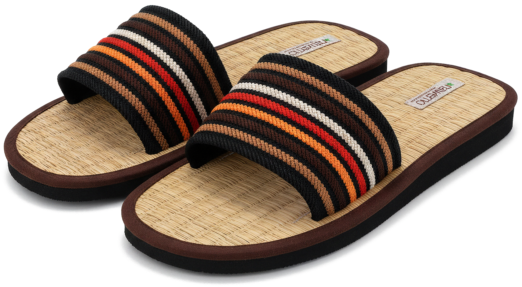 Zimtlatschen Nawemo "Brown-Strap" Zimtlatschen Nawemo 'Brown-Strap' mit breitem elastischem Riemen in Braun-, Schwarz- und Orangetönen.